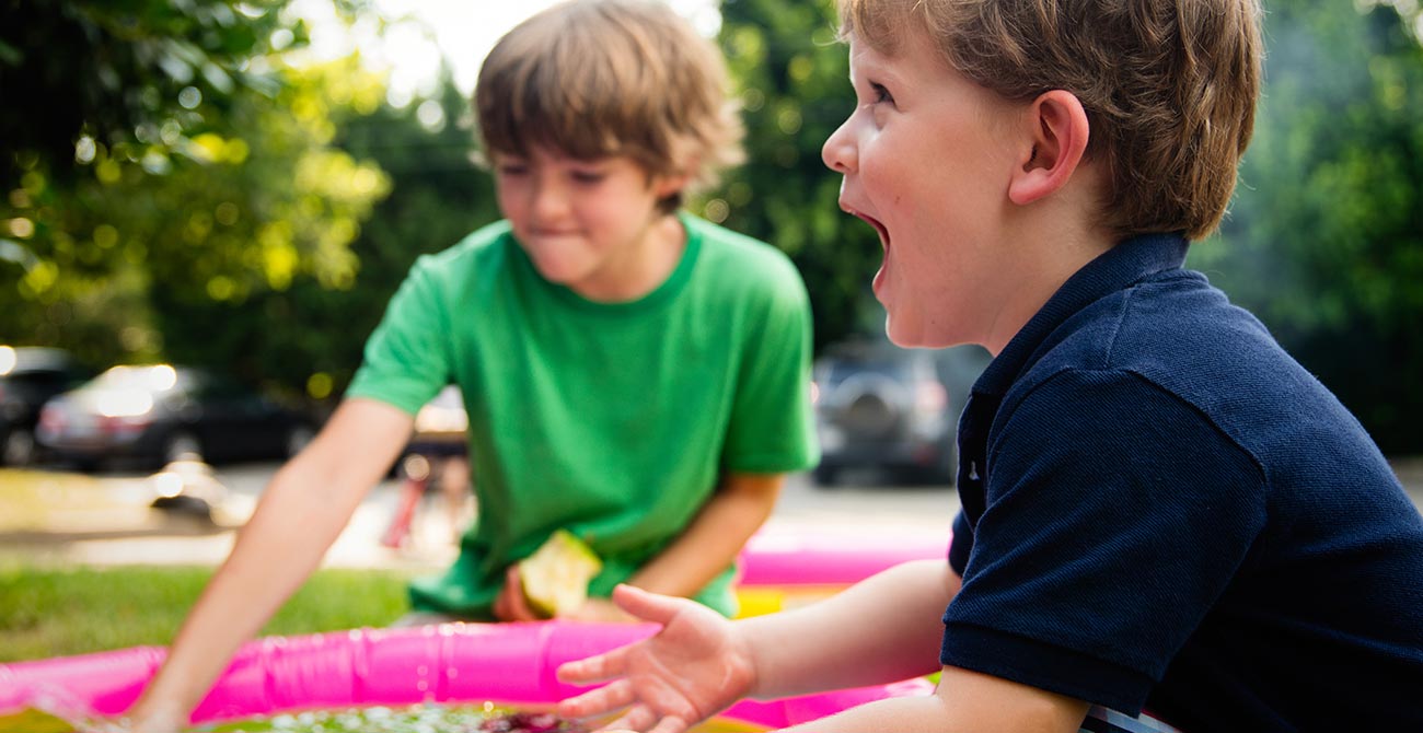 two kids playing outside